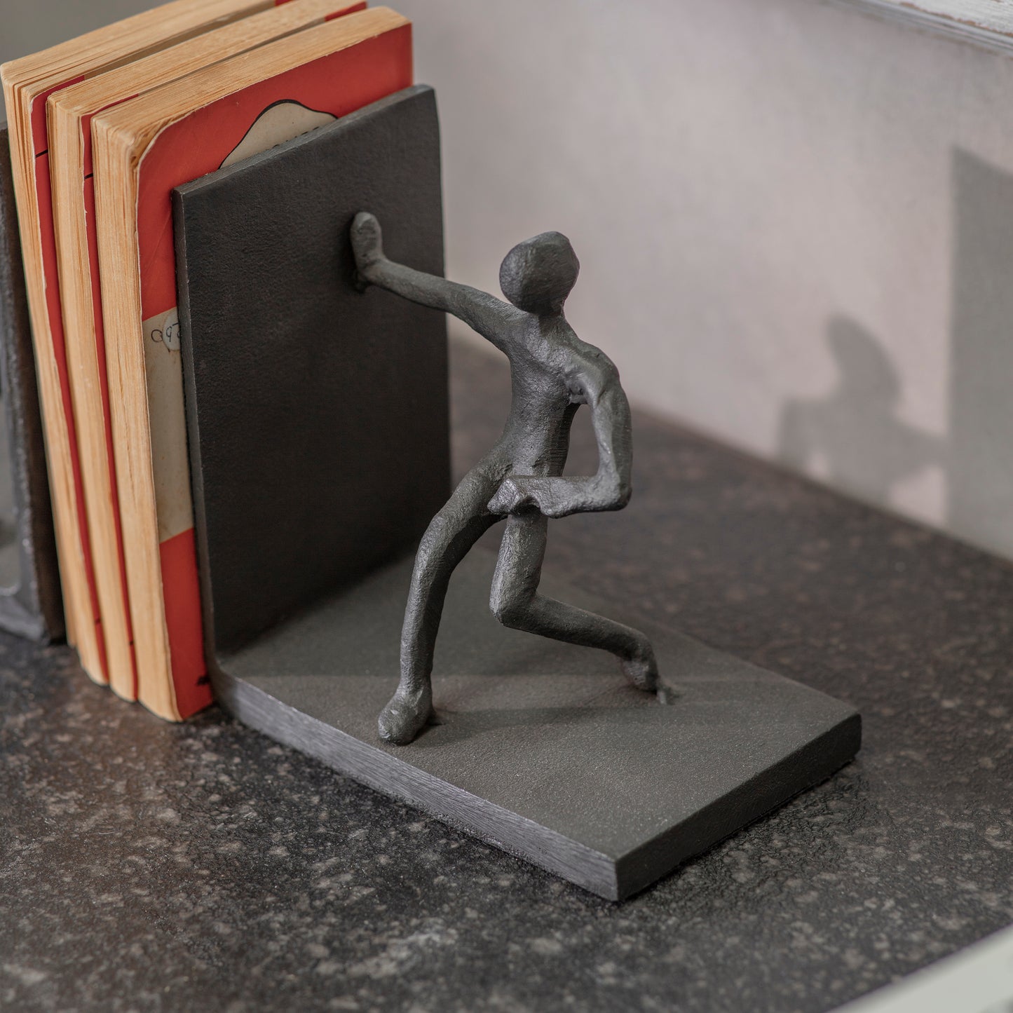 Aluminium Pushing People Bookends