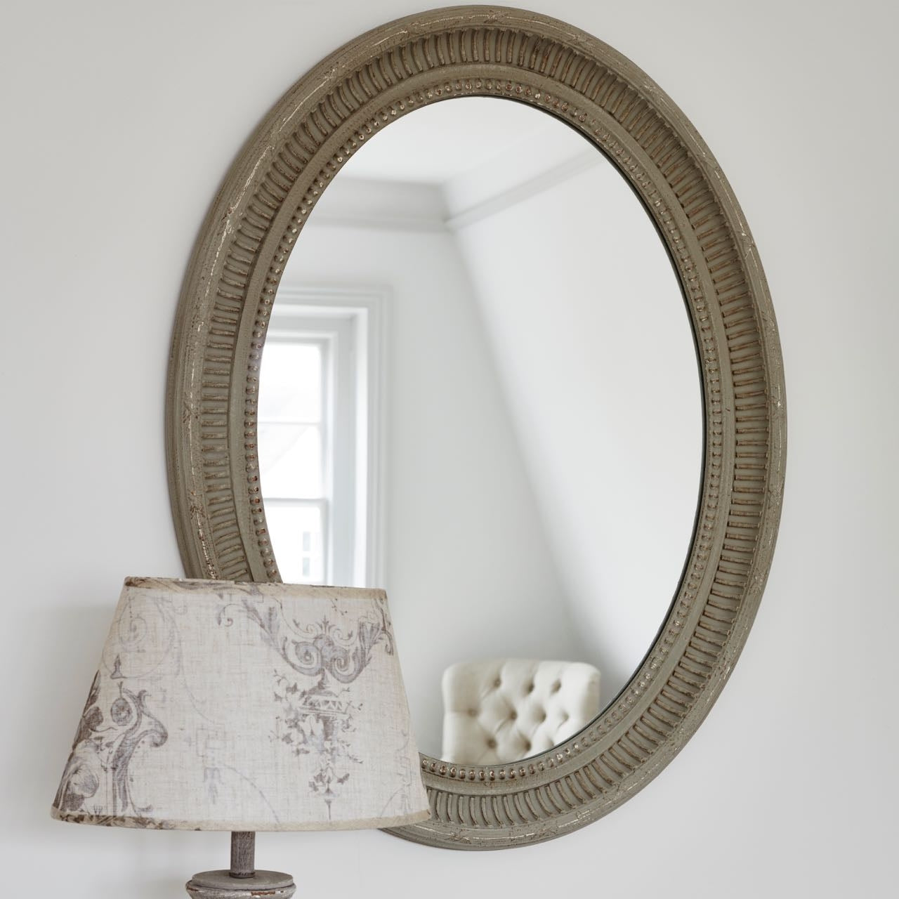 Wilton Oval Mirror with Cut Edge Design